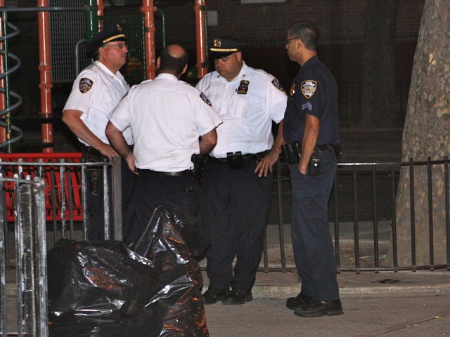 More than 100 people were near the basketball court and playground to watch the tournament, police said.
