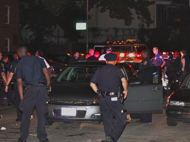 Police swarmed the Forest Houses in the Morrisania section of The Bronx, where 4-year-old Lloyd Morgan was shot and killed.