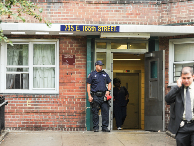 A Police Officer at the scene on East 165th Street where 4yr old Lloyd Morgan was killed late Sunday night on Monday July 23rd, 2012.