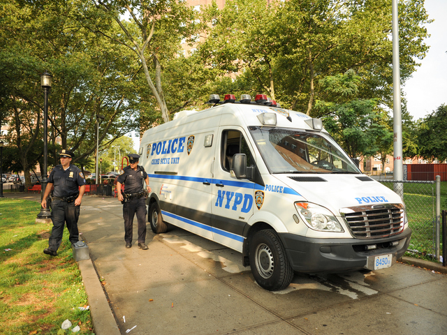 Crime Scene Unit at the scene where a four year old was shot and killed on Monday July 23rd, 2012.