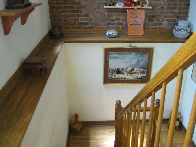 Staircase to downstairs bedrooms at 375 Lincoln Pl. 