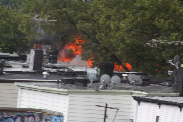 Flames are seen at 3250 Fulton St., a vacant factory in Cypress Hills.