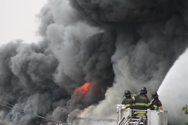 The fire at 3250 Fulton St. sent plumes of heavy smoke into the air.