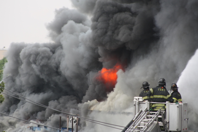 Firefighters battled a three-alarm blaze at 3250 Fulton St.