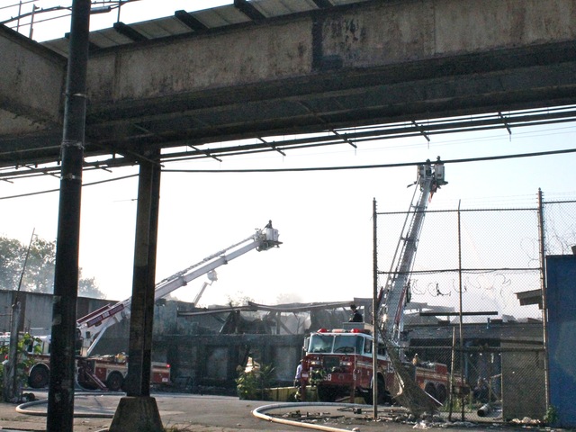 Seven firefighters were injured while battling a seven-alarm fire in Cypress Hills on July 24, 2012.