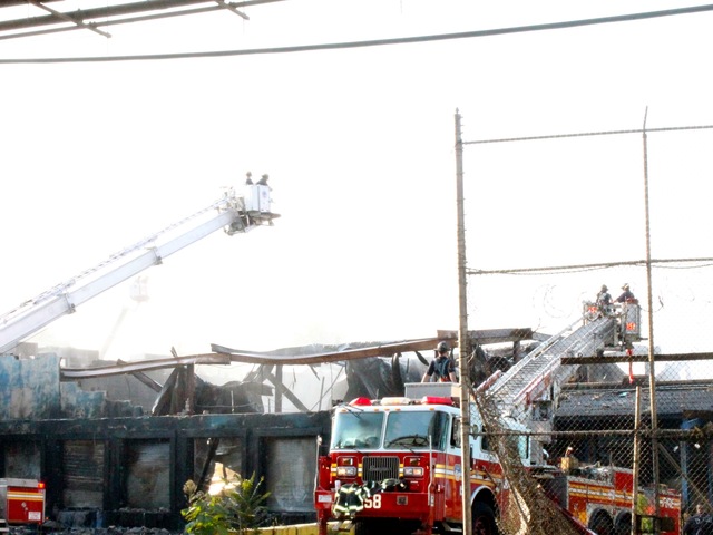 A seven-alarm fire tore through a vacant food factory in Brooklyn on July 23, 2012.