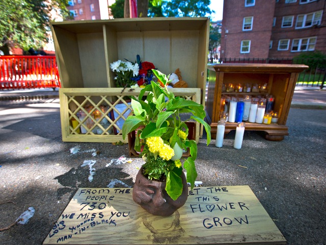 Residents of the Forest Houses in Morrisania set up a makeshift memorial for Lloyd Morgan, 4, who was shot and killed on July 22, 2012.