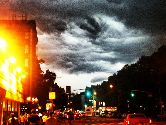 Storm clouds above a New York street July 26, 2012. 