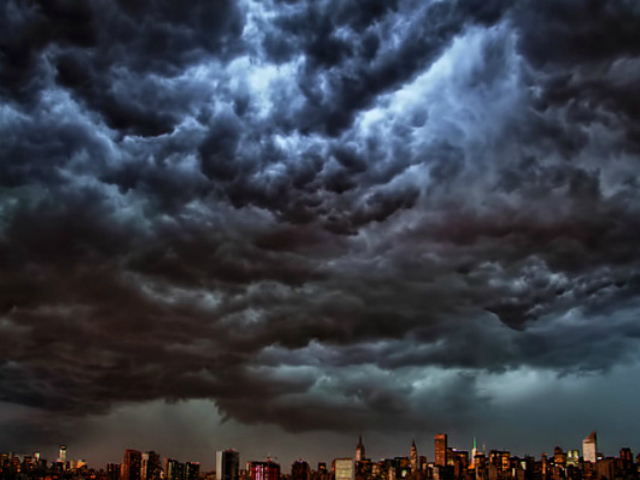 Dark clouds rolled in over the New York City skyline July 26, 2012. 