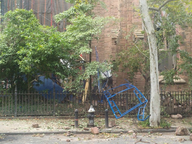 Scaffold and debris littered the ground Friday morning, July 27, 2012, near the site where Richard Schwartz, 61, was killed.