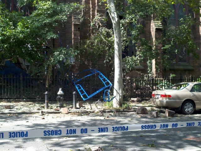 Rocks and scaffolding lay on the ground outside Christ Church, Cobble Hill, in Brooklyn Friday, July 27, 2012.