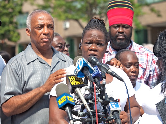 Leteria Hinton, here with City Councilman Charles Barron, after her 2-year-old granddaughter was shot during a drive-by shooting on July 29, 2012.