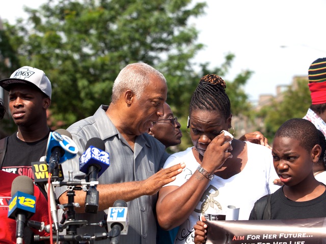 Leteria Hinton, with City Councilman Charles Barron, crying after her granddaughter, Ariyanna Prince, 2, was shot during a drive-by shooting in Brownsville on July 29, 2012.