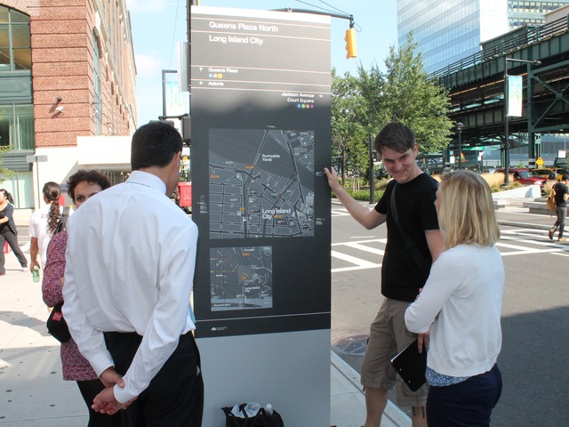 One of the mock-ups of the signs was unveiled in Queens Plaza on Monday and passersby were asked to give their feedback.