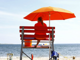 Lifeguards Pull Woman From Water at Manhattan Beach