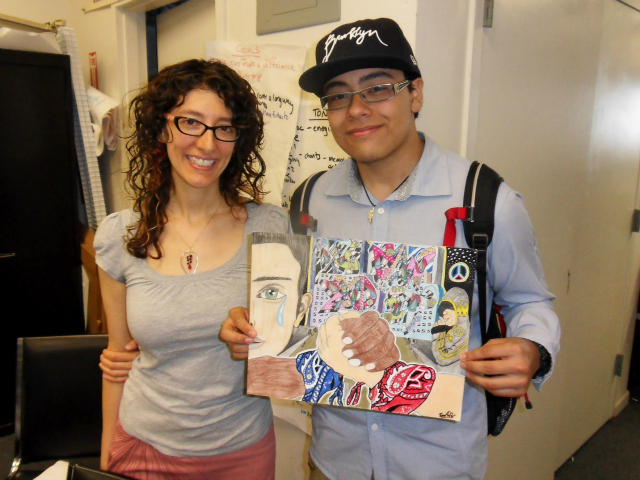 SOS Crown Heights director, Amy Ellenbogen, with Jose Cedillo, who won the group's Arts to End Violence contest with a piece about gangs.