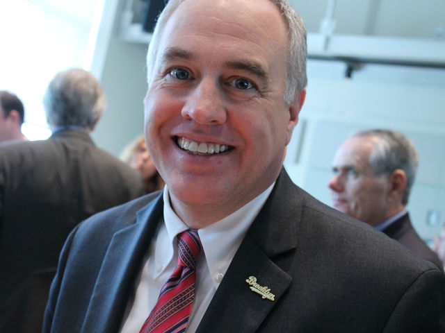New York State Comptroller Thomas P. DiNapoli wears a Brooklyn pin. 