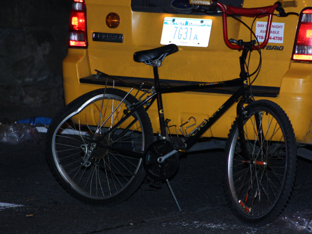 A damaged bike was left behind after a cab hit a cyclist July 30, 2012 at Park Avenue and East 108th Street. 