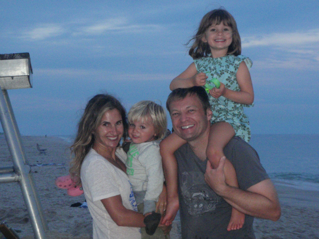 Erika Teresko, shown with her husband and two children, started a petition to demand answers on delays to the Asphalt Green Battery Park City community center. 