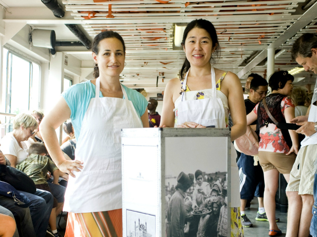 Laura Nova and Theresa Loong, creators of Feed Me a Story, on the ferry to Ellis Island. 