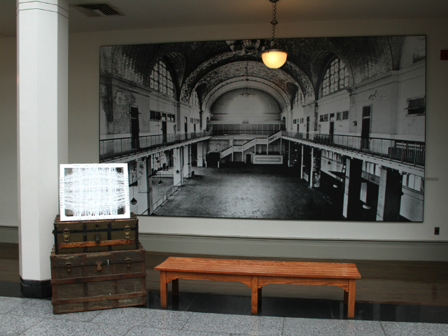 Debra Scacco's lace-woven family tree, "Richiama," on display at Ellis Island. 