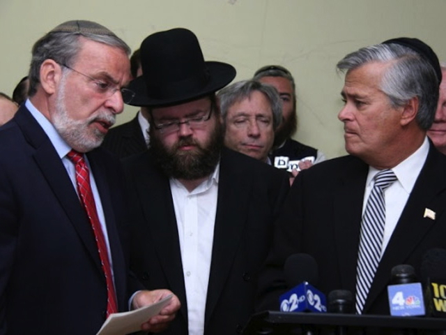 Nachman Kletzky (center) at a press conference with state Assemblyman Dov Hikind (left) and state Sen. Dean Skelos.
