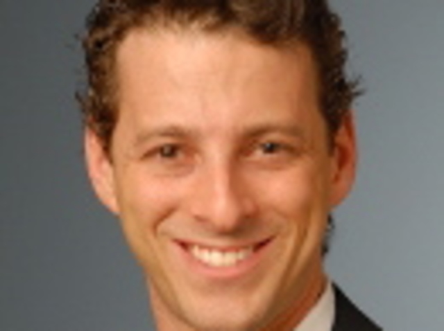 Urologist Adam W. Levinson was arrested on charges of unlawful surveillance after he allegedly took video up a woman's skirt at a subway stop.