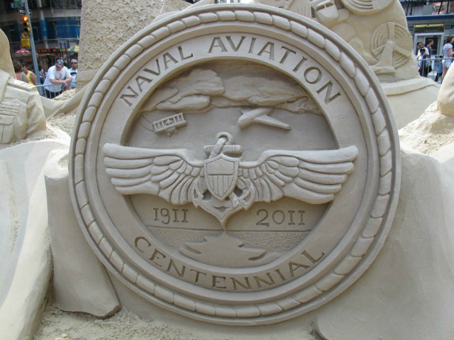 A sand sculpture by Staten Island professional Matt Long in Time's Square. Long will run and judge a lighthouse sand building contest on August 25, part of the Lighthouse Museum's Lighthouse Hunt and Beach Party. 