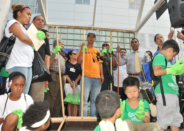 District 10 Councilman Ydanis Rodriguez and State Senator Adriano Espaillat kick off the second Northern Manhattan Clean Streets Initiative in Mckena Square at W. 165th Street on August 9, 2012.