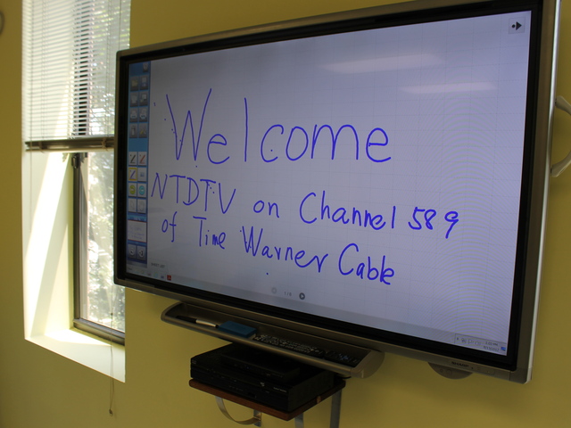 The "smart board" at Good Shepherd Services' new computer learning lab functions like a digital chalkboard.