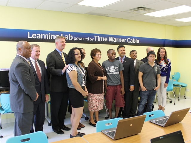 Elected officials, Time Warner Cable representatives, and employees and clients of Good Shepherd Services gathered to celebrate the nonprofit's new computer lab.