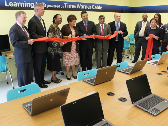 Elected officials, Time Warner Cable representatives, and employees and clients of Good Shepherd Services gathered to celebrate the nonprofit's new computer lab.