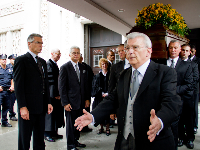 Pall bearers carry the casket of Marvin Hamlisch Aug. 14 out of Temple Emanu-El at 65th Street and 5th Avenue on the Upper East Side. 