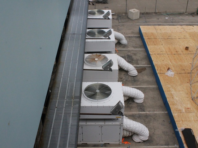 Massive air coolers at the Jaguar ChillNY site under the High Line.