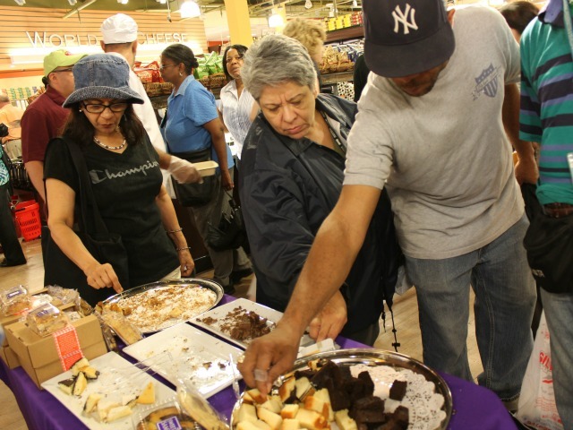 Shoppers picked up samples of pound cake at 55 Fulton Market Aug. 15, 2012. 