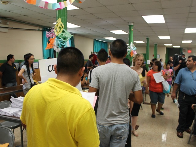 Young people waiting for help filling out their forms Wednesday afternoon.