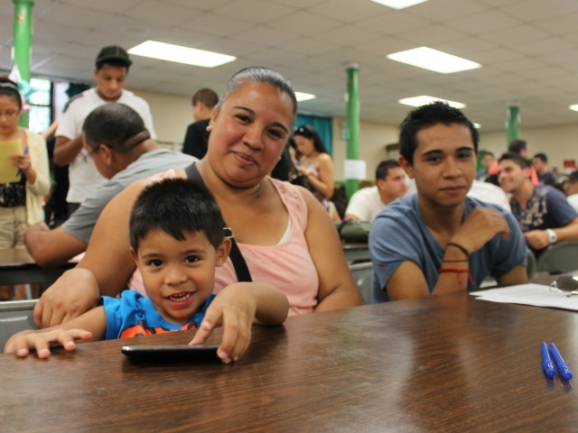 Valeria and her son, Jose, were among those who waited for help. Jose was born in Chile, but grew up in the United States. He hoped the new regulations will help him find a steady job.