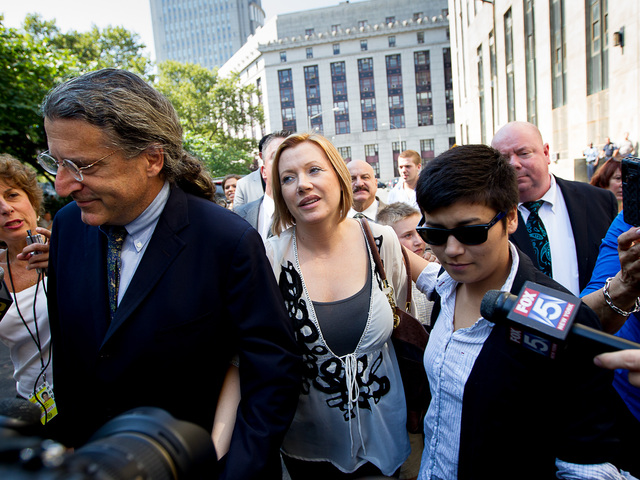 Anna Gristina, 44, leaves Manhattan Supreme Court with daughter Suzanna Pak, 24, and her lawyer Norman Pattis on August 16th, 2012.
