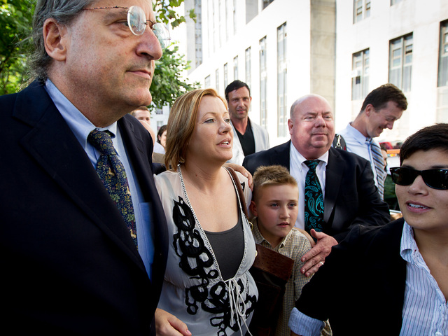 Anna Gristina, 44, leaves Manhattan Supreme Court with son Nicholas, 9, and her lawyer Norman Pattis on August 16th, 2012.