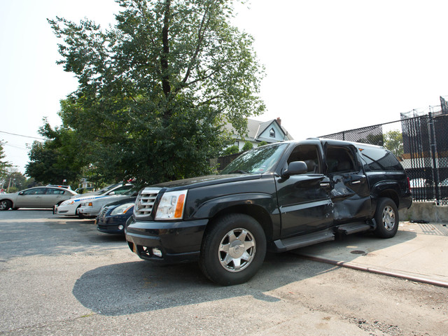 The Cadillac Escalade that struck a pair of men on a motorcycle Aug. 17, 2012. 