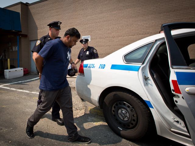 Mohan Omesh, 29, is accused of hitting two people on a motorcycle with his Cadillac Escalade Aug. 17, 2012. 
