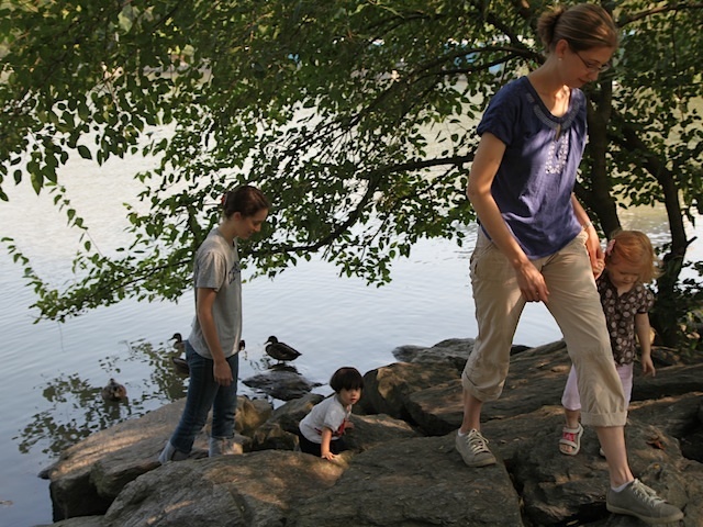 Katherine Ness taker her daughter Lydia to feed the ducks in Inwood Park almost every day. 