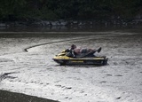 Jet-Skiers Get Stuck in the Mud in New York City