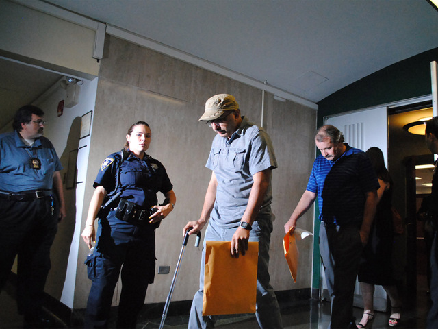 New York City Transit subway signal maintainers Abbas Chaudhry, left, and Christopher Winton, right, were released after being charged tampering with public records along with six of their colleagues in the MTA.