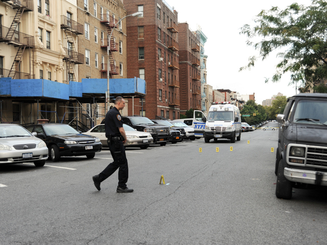 <p>A police officer at the scene on Tuesday August 21st, 2012.</p>
