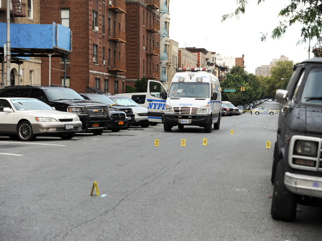 <p>Evidence at the scene where Darius Robinson, 17, was shot and killed on Tuesday August 21st, 2012.</p>
