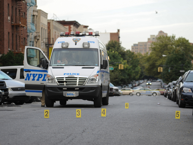 <p>Evidence at the scene of the shooting death of 17-year-old Darius Robinson on Tuesday August 21st, 2012.</p>
