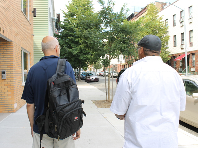 Bob (left) and another resident, who did not want to show their faces, said they were impressed by the services at the 400 McGuiness Blvd. shelter.