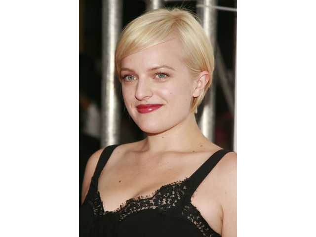 The newly platinum blonde Elisabeth Moss at 