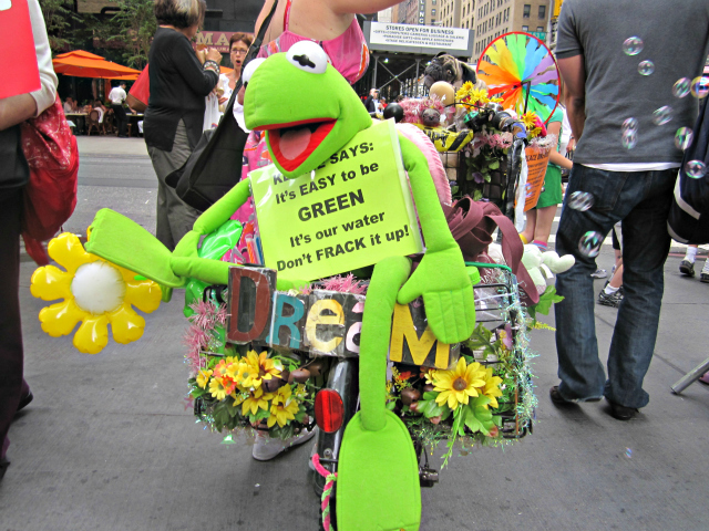 On the back of Nadette Stasa's bike sat a Kermit the Frog stuffed animal with a sign reading: 